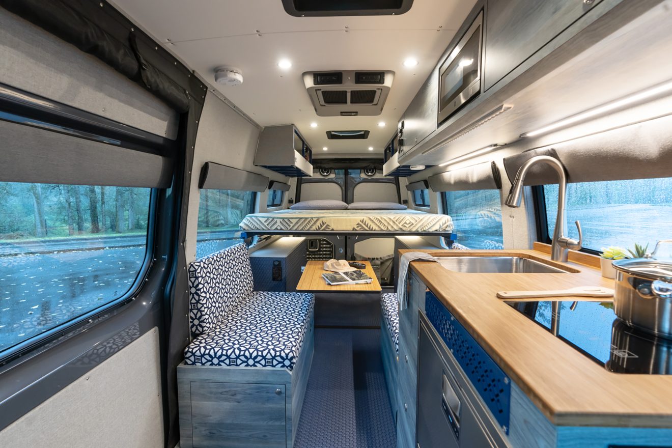 custom van conversion Mellifera Van 2022 mercedes benz sprinter 170 4wd seat two sleep three interior cabin galley
