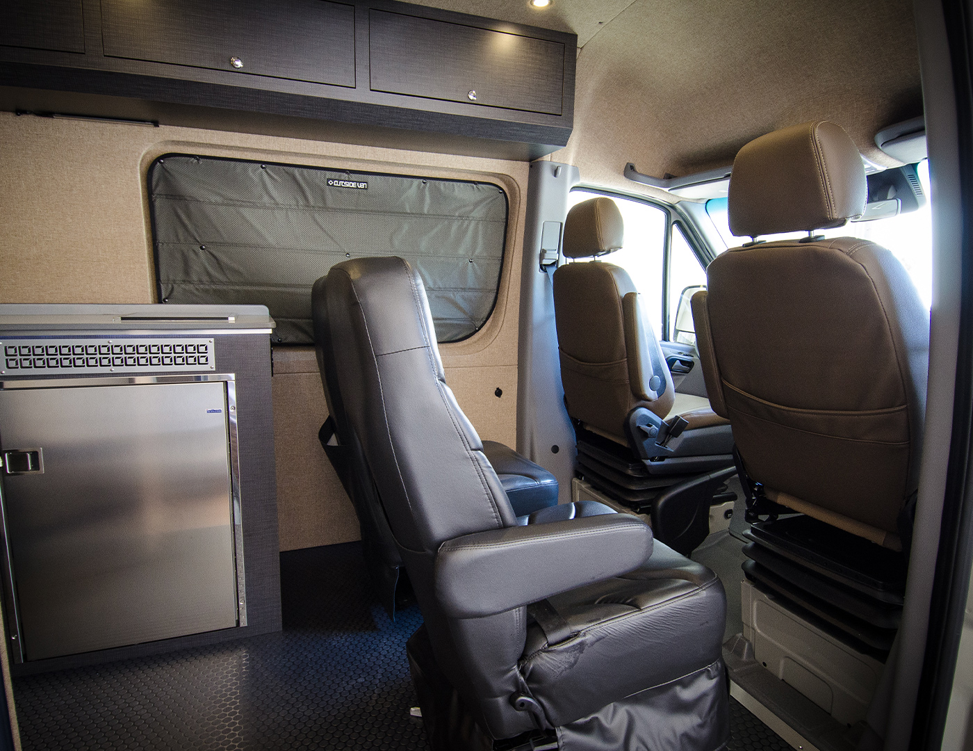 outside van that is luxury travel vehicle that is ready to sleep shower and travel in style